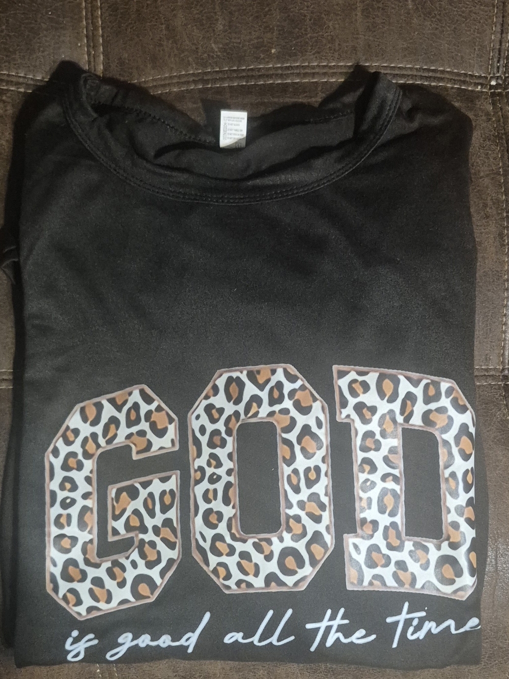 Black Graphic Tee with Leopard 'GOD' Design